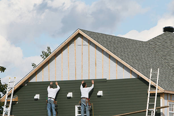 Professional Siding Installation technician working in Monrovia, IN
